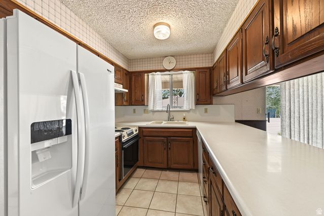 1390 W MARINWOOD AVE, Taylorsville, UT 84123