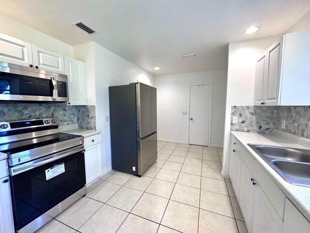 3692 Corrigan Court, Palm Springs, FL 33461