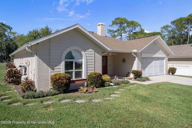 7167 Crown Oaks Drive, Spring Hill, FL 34606