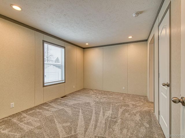 284 Dakota Court, Sumpter Township, MI 48111