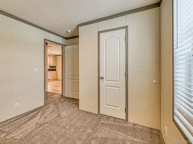 284 Dakota Court, Sumpter Township, MI 48111