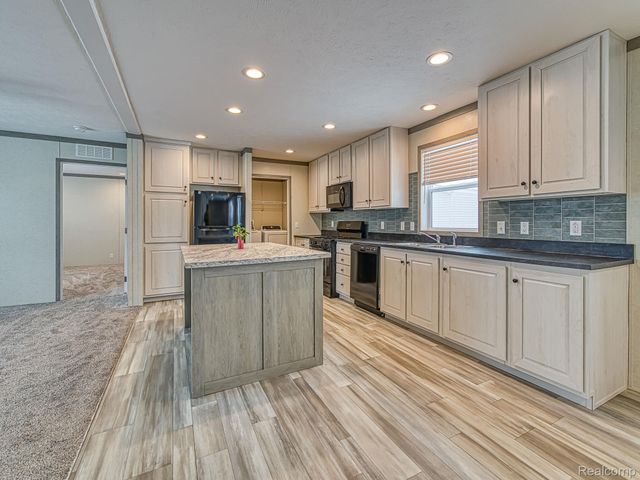 284 Dakota Court, Sumpter Township, MI 48111