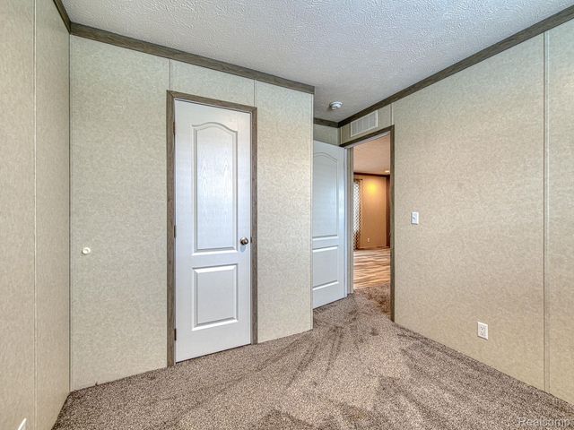 284 Dakota Court, Sumpter Township, MI 48111