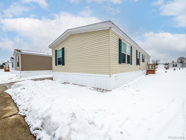 284 Dakota Court, Sumpter Township, MI 48111