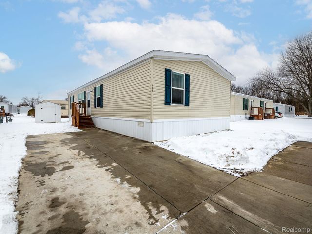 284 Dakota Court, Sumpter Township, MI 48111