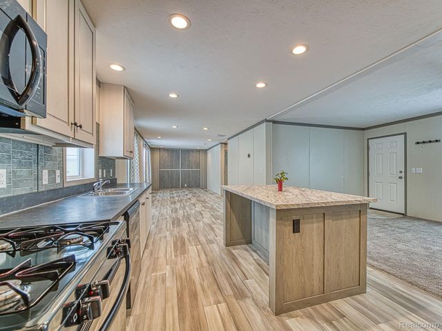 284 Dakota Court, Sumpter Township, MI 48111