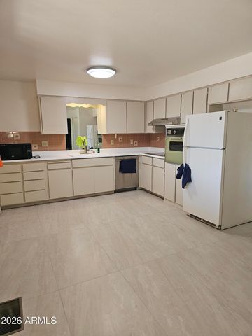 6037 W INDIAN SCHOOL Road, Phoenix, AZ 85033