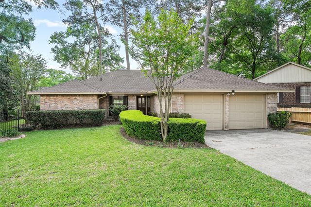 112 Quiet Wind Drive, Conroe, TX 77356