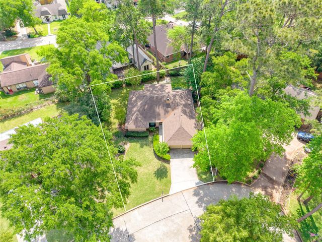 112 Quiet Wind Drive, Conroe, TX 77356