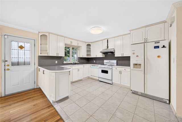 87-16 Palo Alto Street, Hollis, NY 11423
