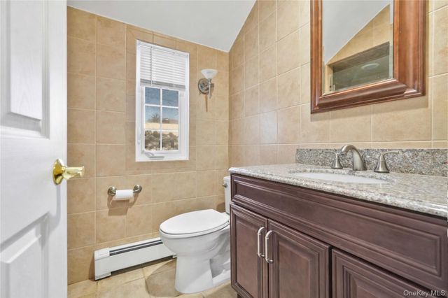 61 Squirrel Hill Road, East Hills, NY 11577