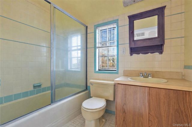 61 Squirrel Hill Road, East Hills, NY 11577