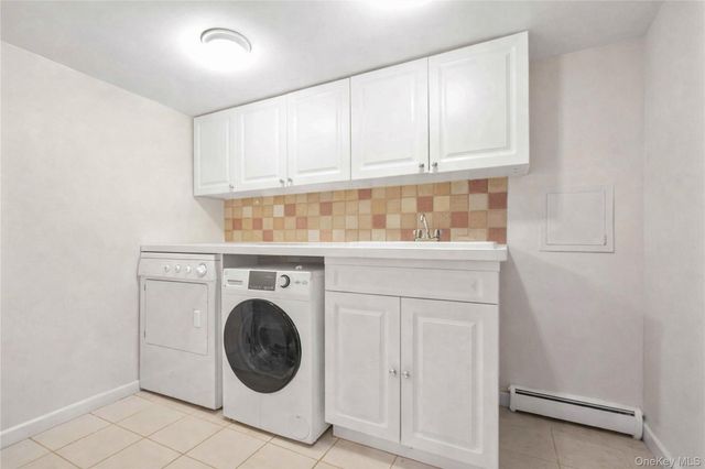 61 Squirrel Hill Road, East Hills, NY 11577