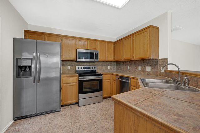 1630 Trail Oaks Court, Houston, TX 77339