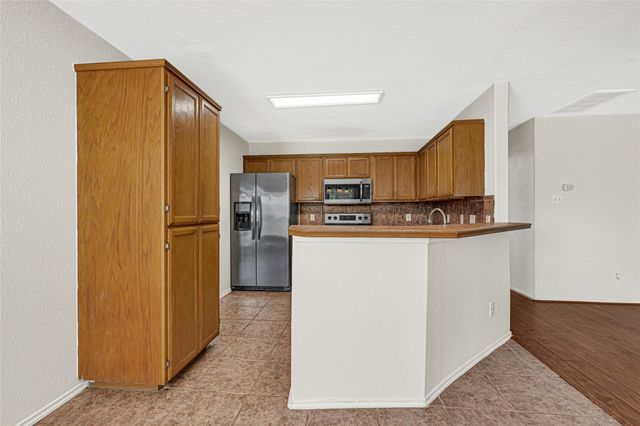 1630 Trail Oaks Court, Houston, TX 77339