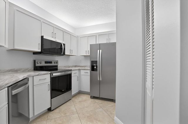 800 Uno Lago Drive 102, Juno Beach, FL 33408