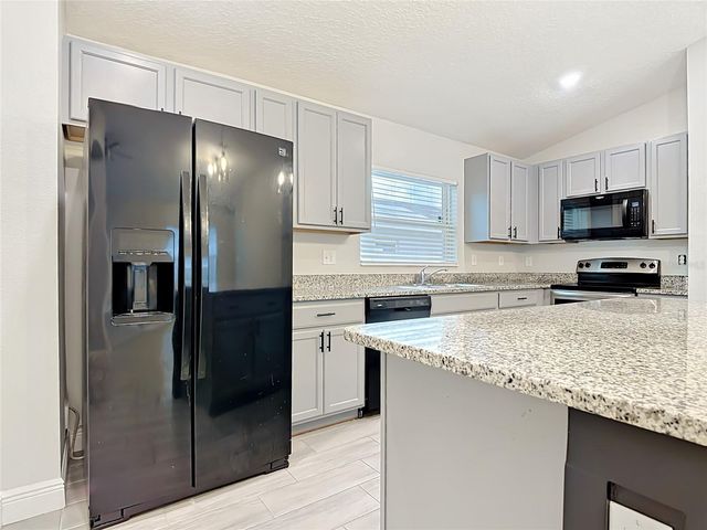 3040 LAKES CREST AVENUE, St Cloud, FL 34772