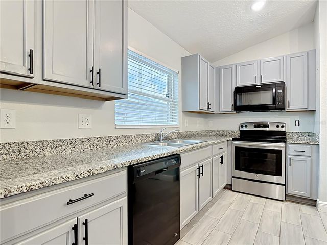 3040 LAKES CREST AVENUE, St Cloud, FL 34772