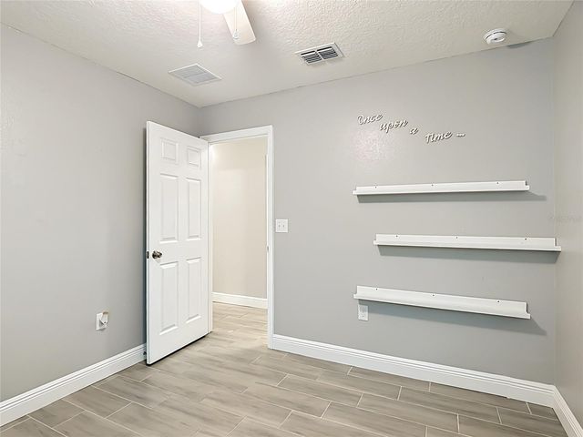 3040 LAKES CREST AVENUE, St Cloud, FL 34772