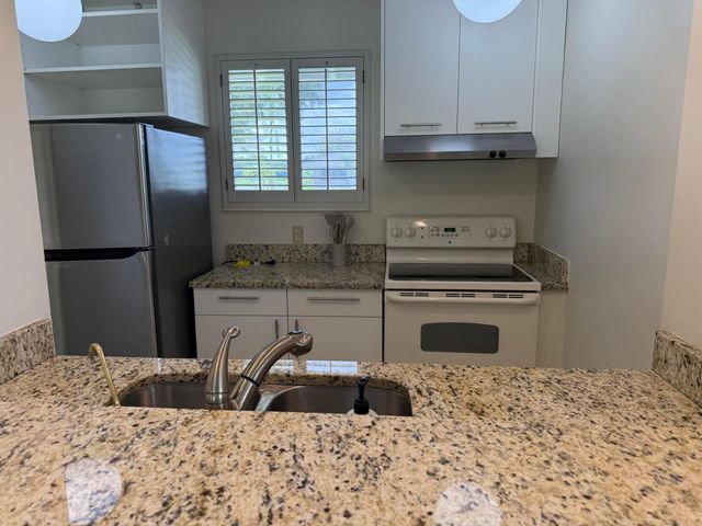 112 Club Drive, Palm Beach Gardens, FL 33418