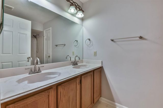 15 Shinyrock Place, The Woodlands, TX 77381