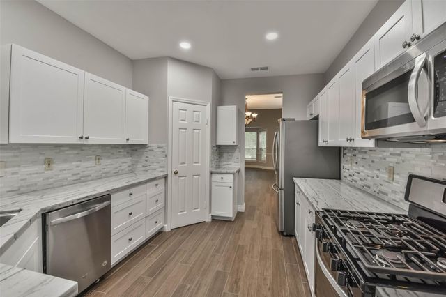 15 Shinyrock Place, The Woodlands, TX 77381