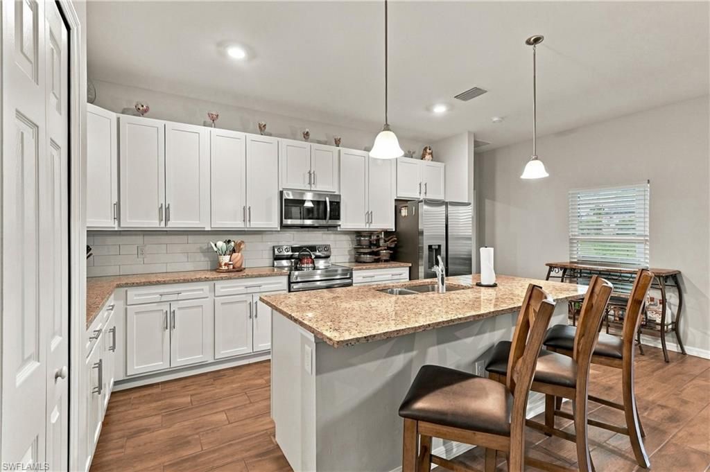 Image 4 of property listing at 3225 NW 21st ST, Cape Coral, FL 33993