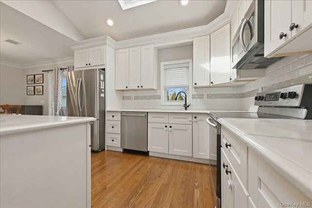 1419 Eric Lane, East Meadow, NY 11554