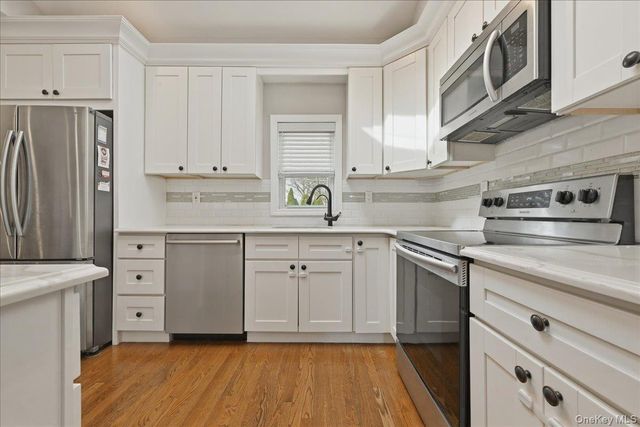 1419 Eric Lane, East Meadow, NY 11554