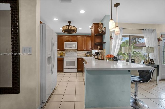 410 SW Natura Ave, Deerfield Beach, FL 33441