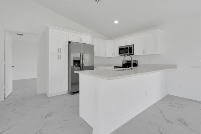 310 NE 9TH TERRACE, Cape Coral, FL 33909