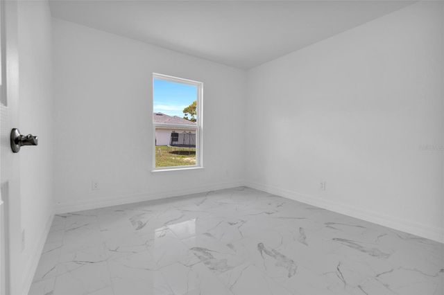 310 NE 9TH TERRACE, Cape Coral, FL 33909