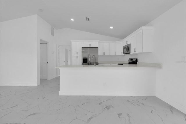 310 NE 9TH TERRACE, Cape Coral, FL 33909