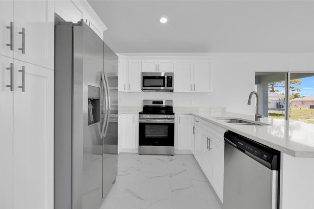 310 NE 9TH TERRACE, Cape Coral, FL 33909