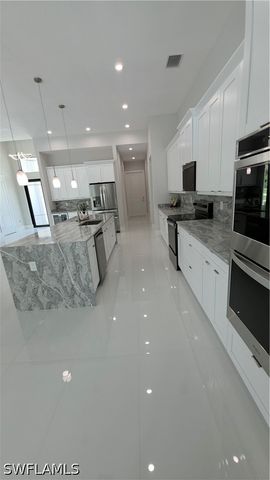 563 15th ST NW, Naples, FL 34120