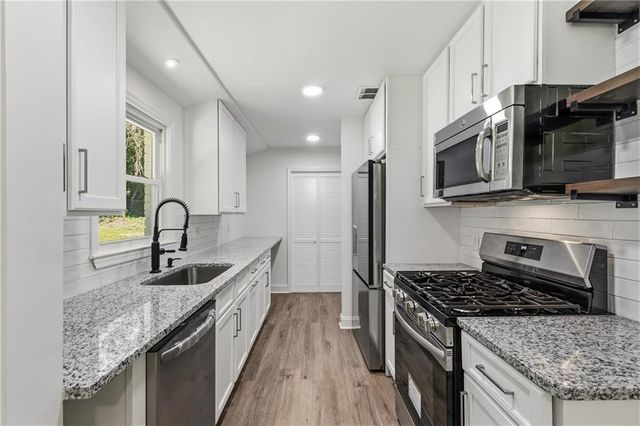 1348 Ridgewood Drive SW, Lilburn, GA 30047