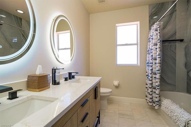 7703 Martino CIR, Naples, FL 34112