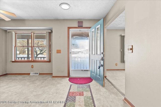 657 Joan Drive, Mason, MI 48854