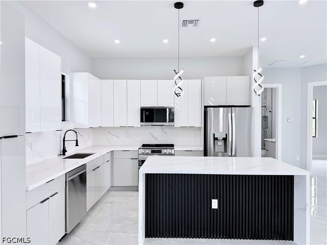 757 Switchboard LN, Lehigh Acres, FL 33974