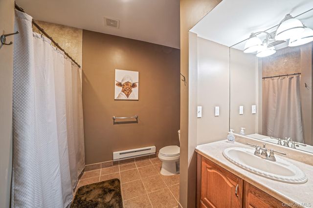 11 Woodstork Drive, Mount Sinai, NY 11766
