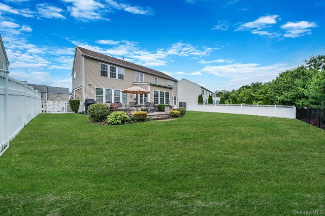 11 Woodstork Drive, Mount Sinai, NY 11766