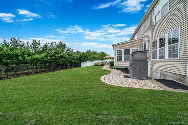 11 Woodstork Drive, Mount Sinai, NY 11766