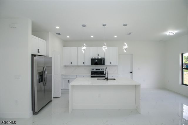 943 Commodore ST, Lehigh Acres, FL 33974