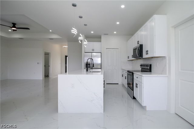 943 Commodore ST, Lehigh Acres, FL 33974