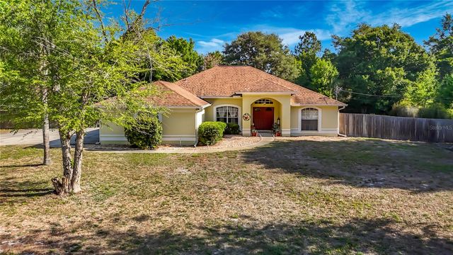 7104 QUAIL HOLLOW BOULEVARD, Wesley Chapel, FL 33544