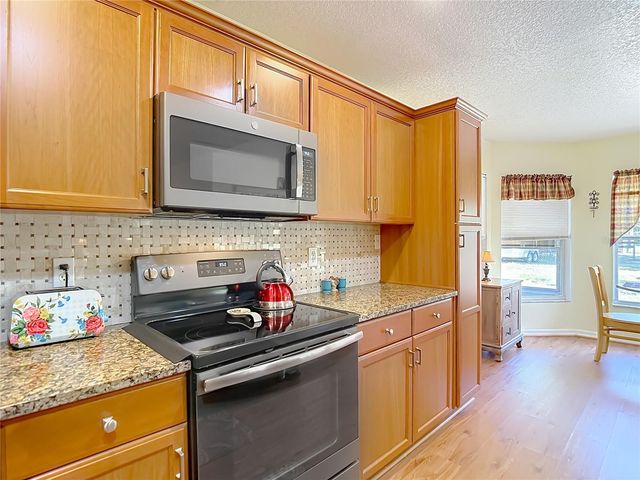 7104 QUAIL HOLLOW BOULEVARD, Wesley Chapel, FL 33544