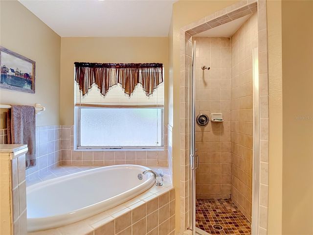7104 QUAIL HOLLOW BOULEVARD, Wesley Chapel, FL 33544