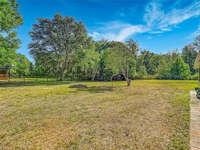 7104 QUAIL HOLLOW BOULEVARD, Wesley Chapel, FL 33544