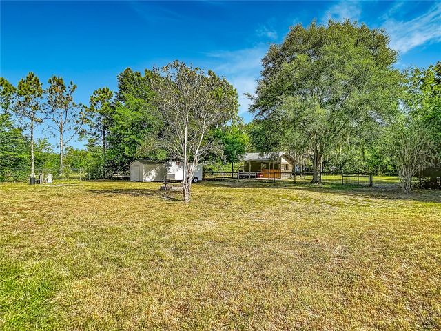 7104 QUAIL HOLLOW BOULEVARD, Wesley Chapel, FL 33544