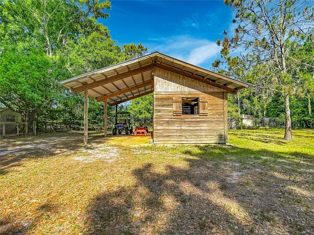 7104 QUAIL HOLLOW BOULEVARD, Wesley Chapel, FL 33544